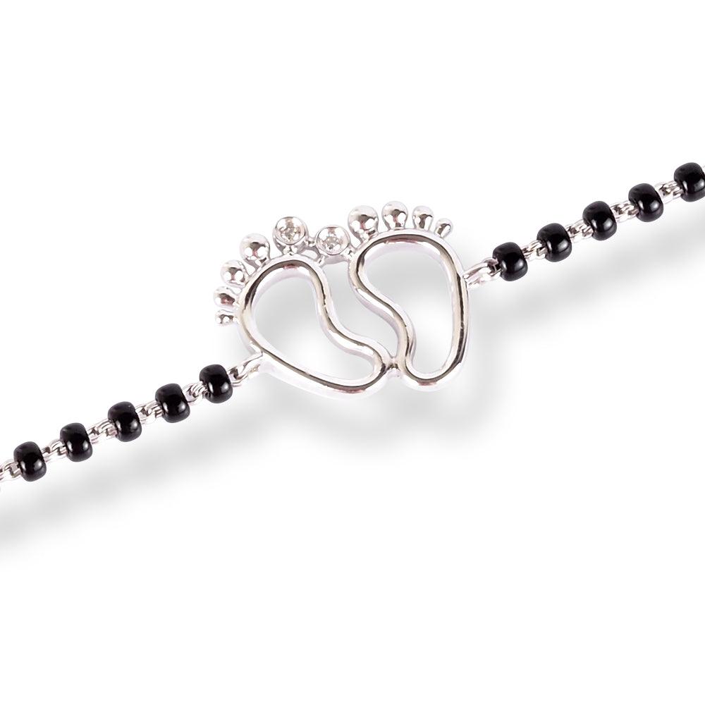 18ct Yellow Gold / 18ct White Gold Diamond Adjustable Children's Bracelet with Small Feet and Black Beads MCS4275 - Minar Jewellers