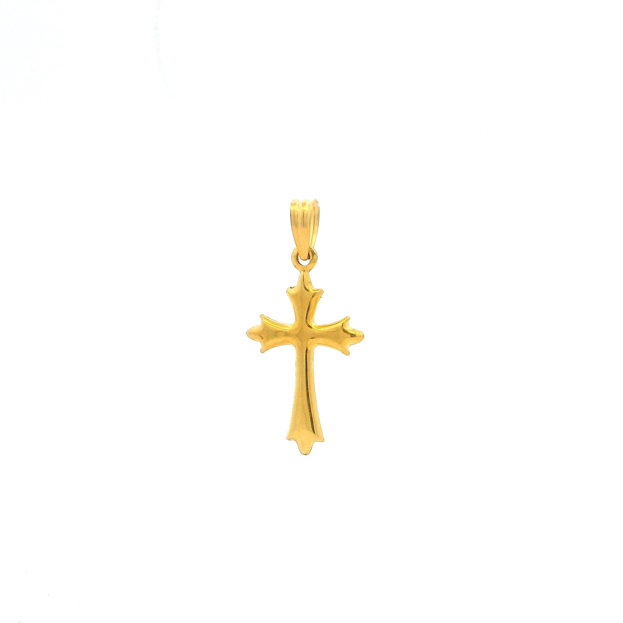 Gold cross pendant on a white background