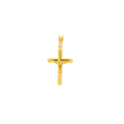 Gold cross pendant on a white background