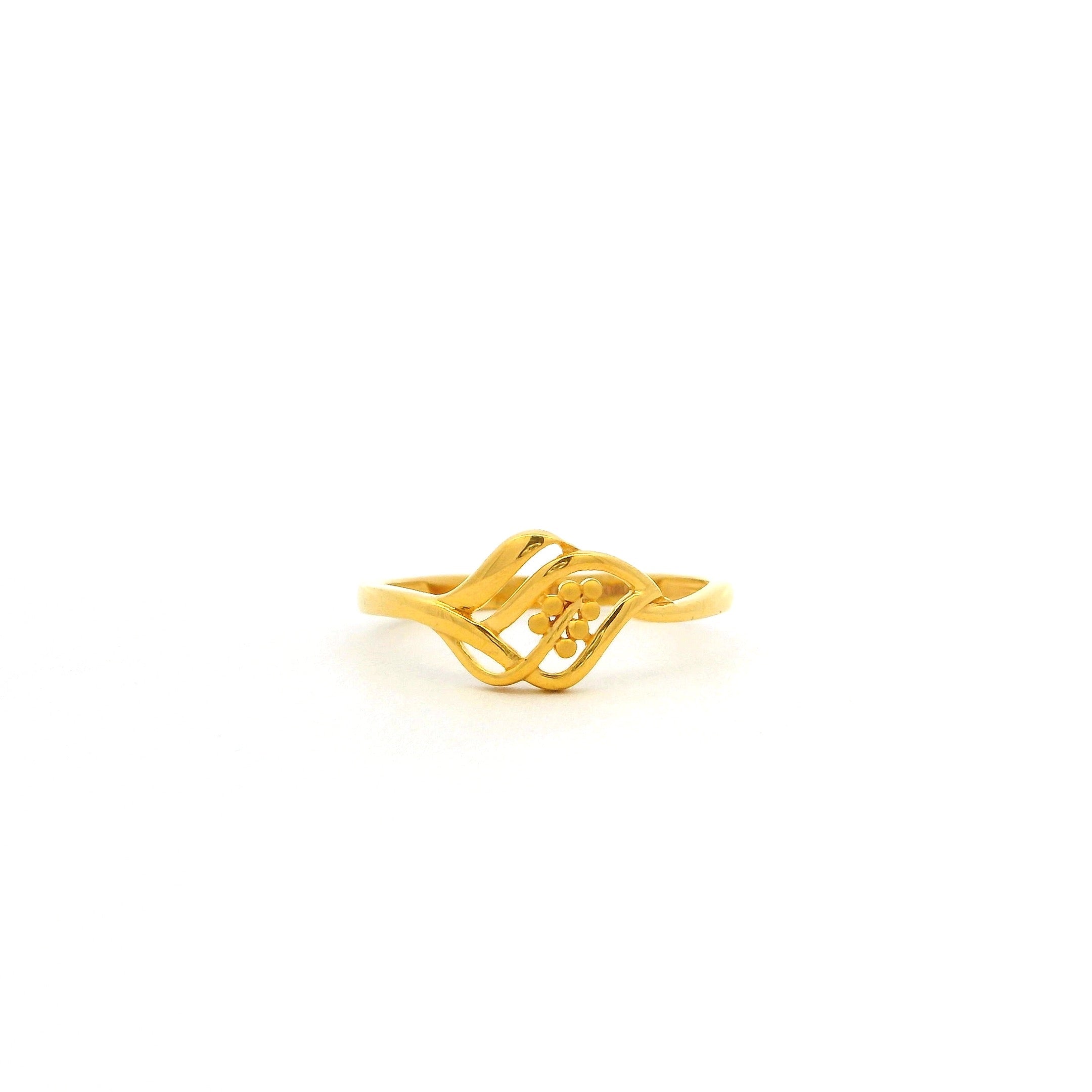 Gold ring with a unique design on a white background