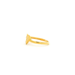 Gold ring on a white background