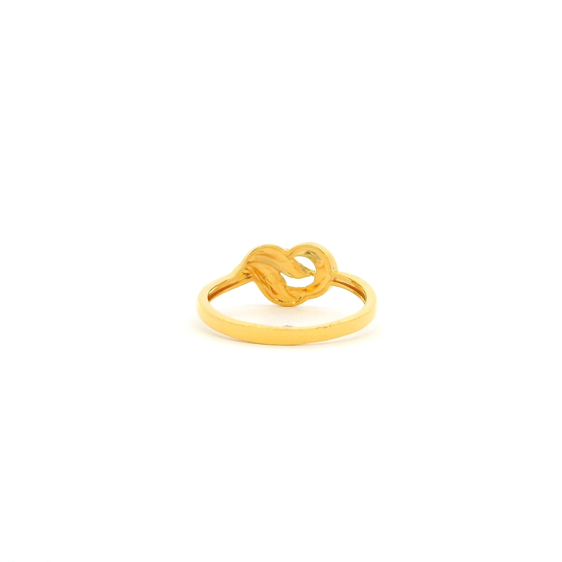 Gold ring with a unique design on a white background
