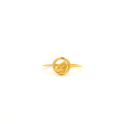 Gold ring with a unique design on a white background
