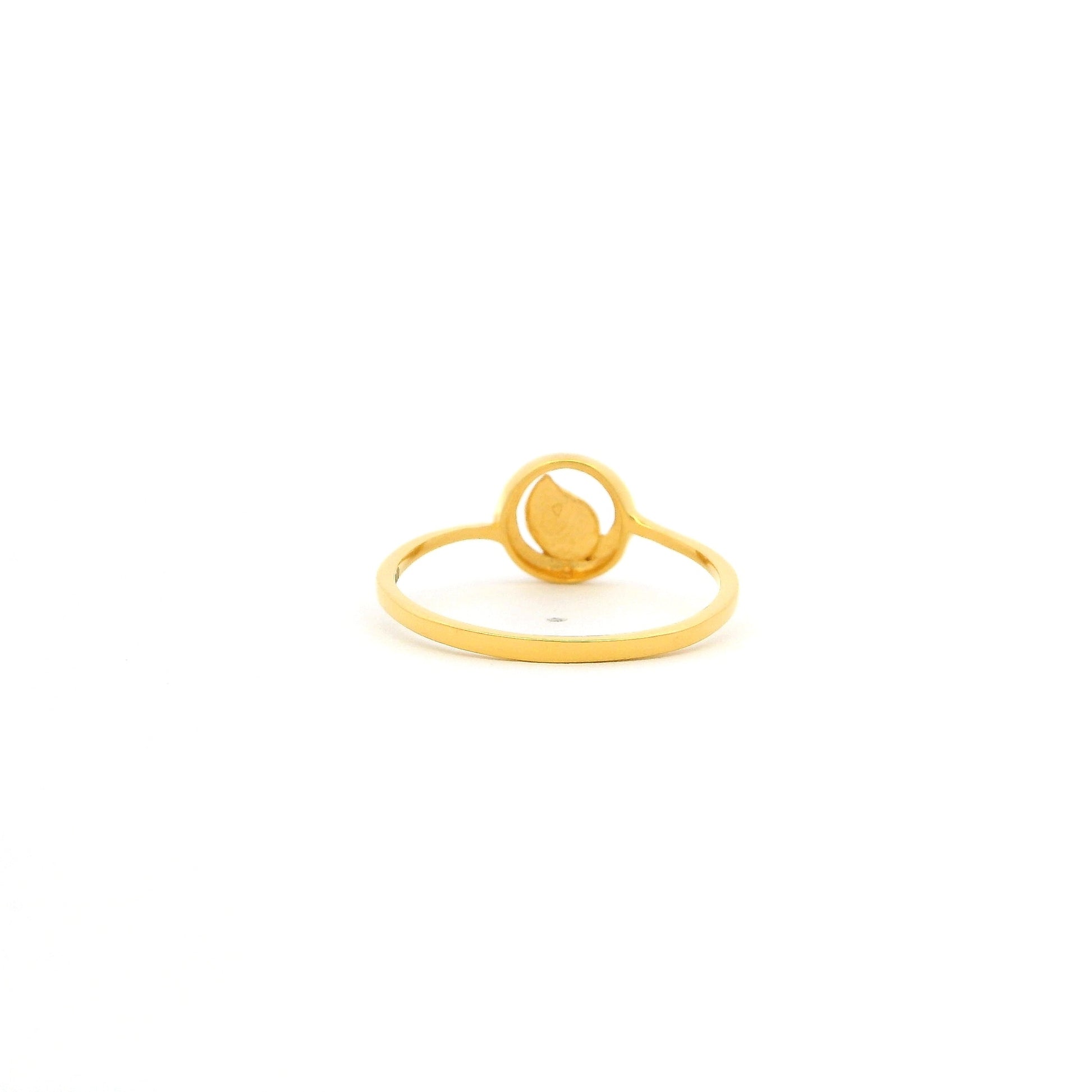 Gold ring on a white background