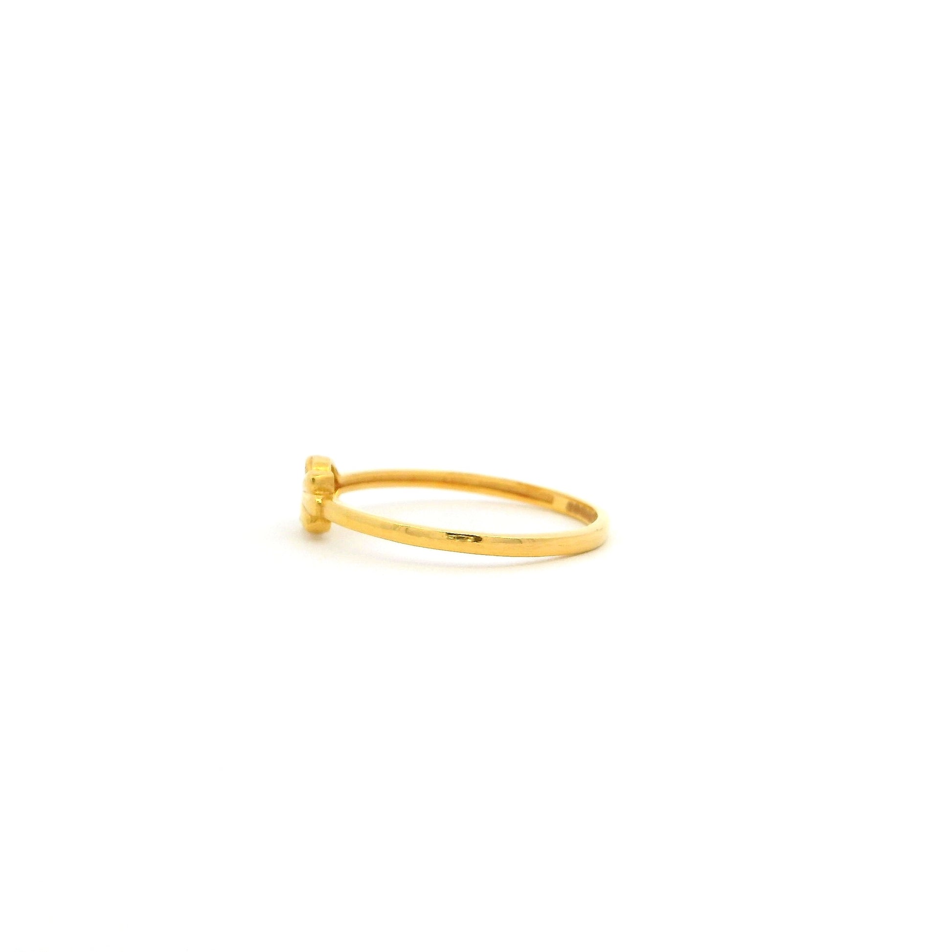 Gold ring on a white background