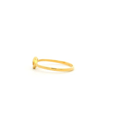 Gold ring on a white background