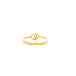 Gold ring with a unique design on a white background