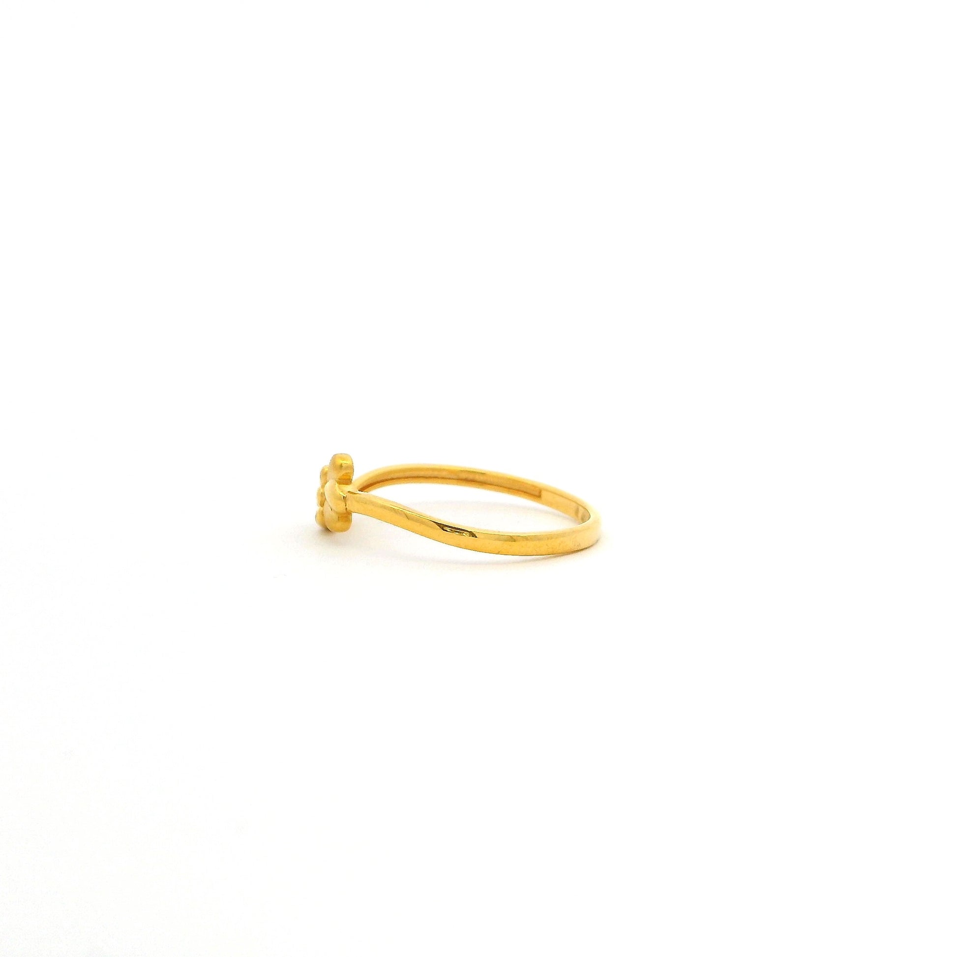Gold ring on a white background