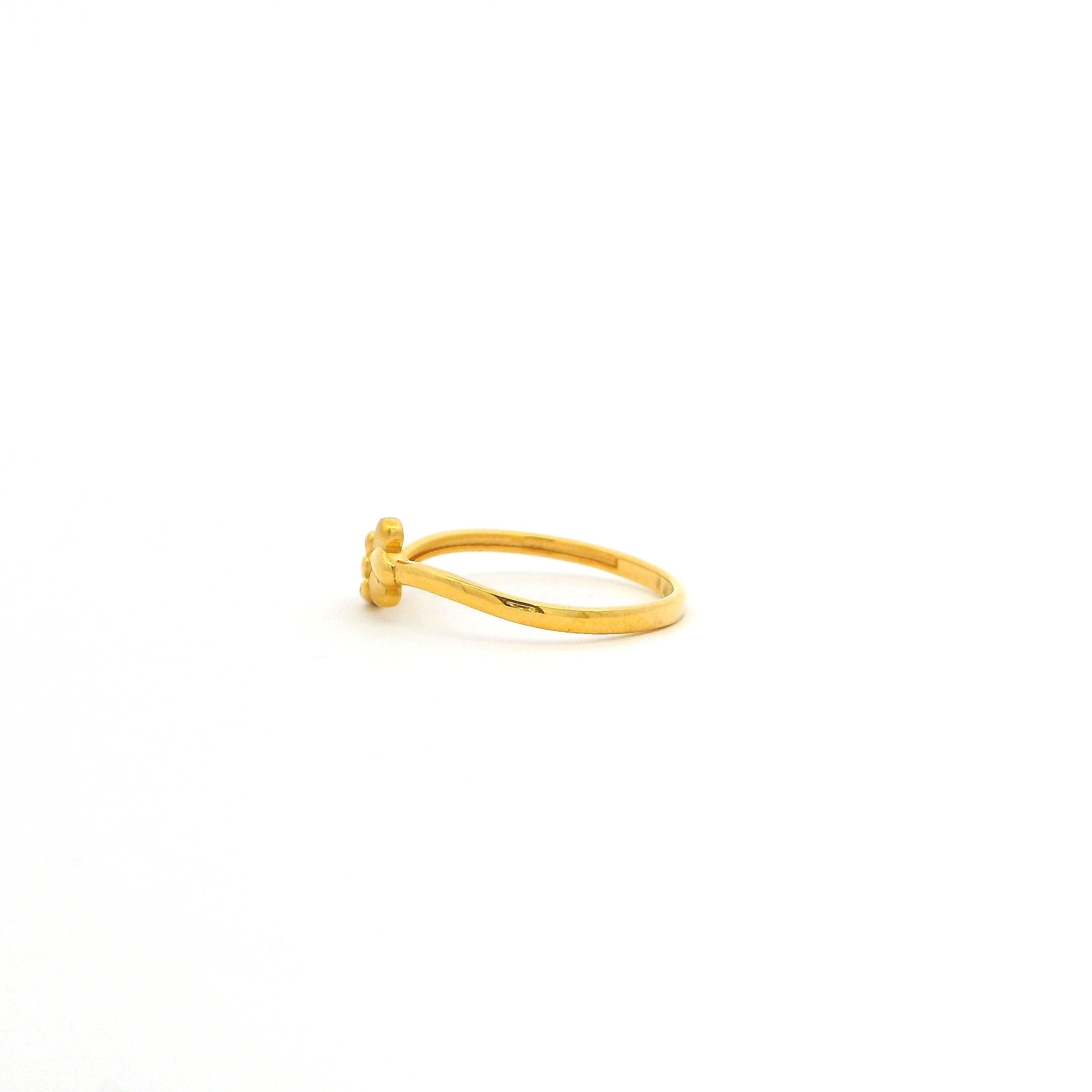 Gold ring on a white background