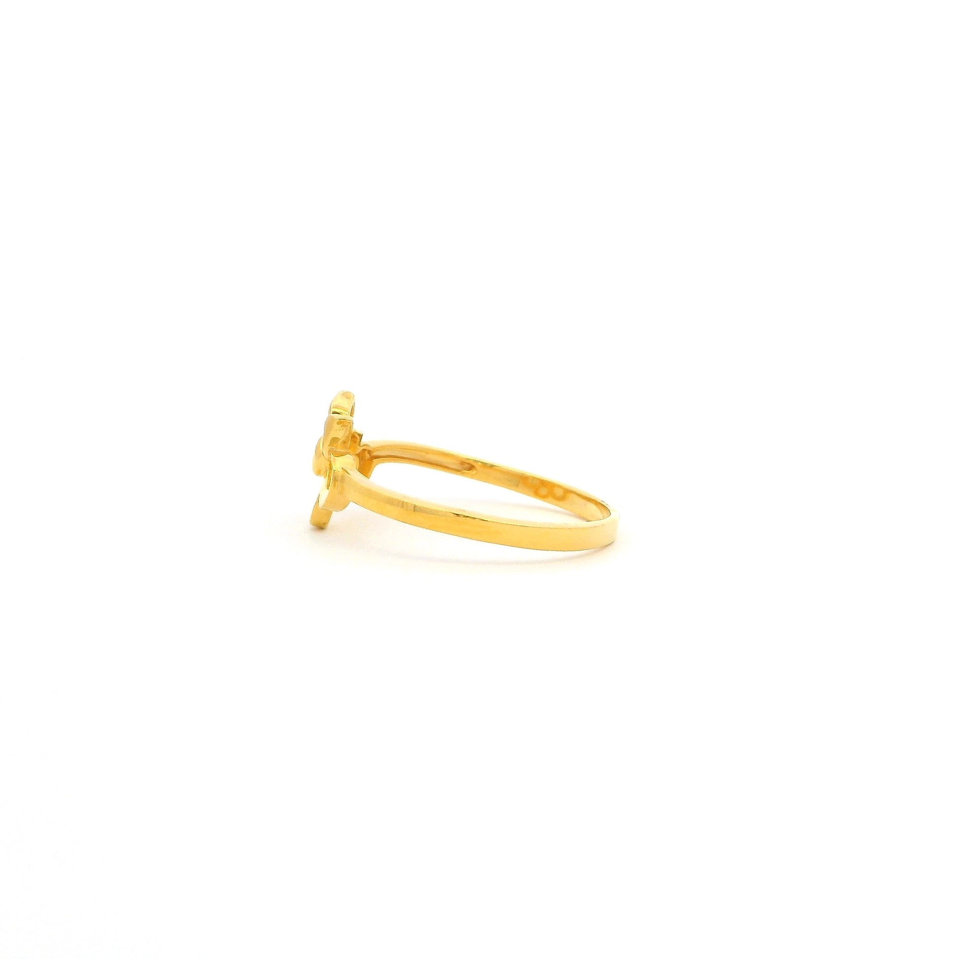 Gold ring on a white background
