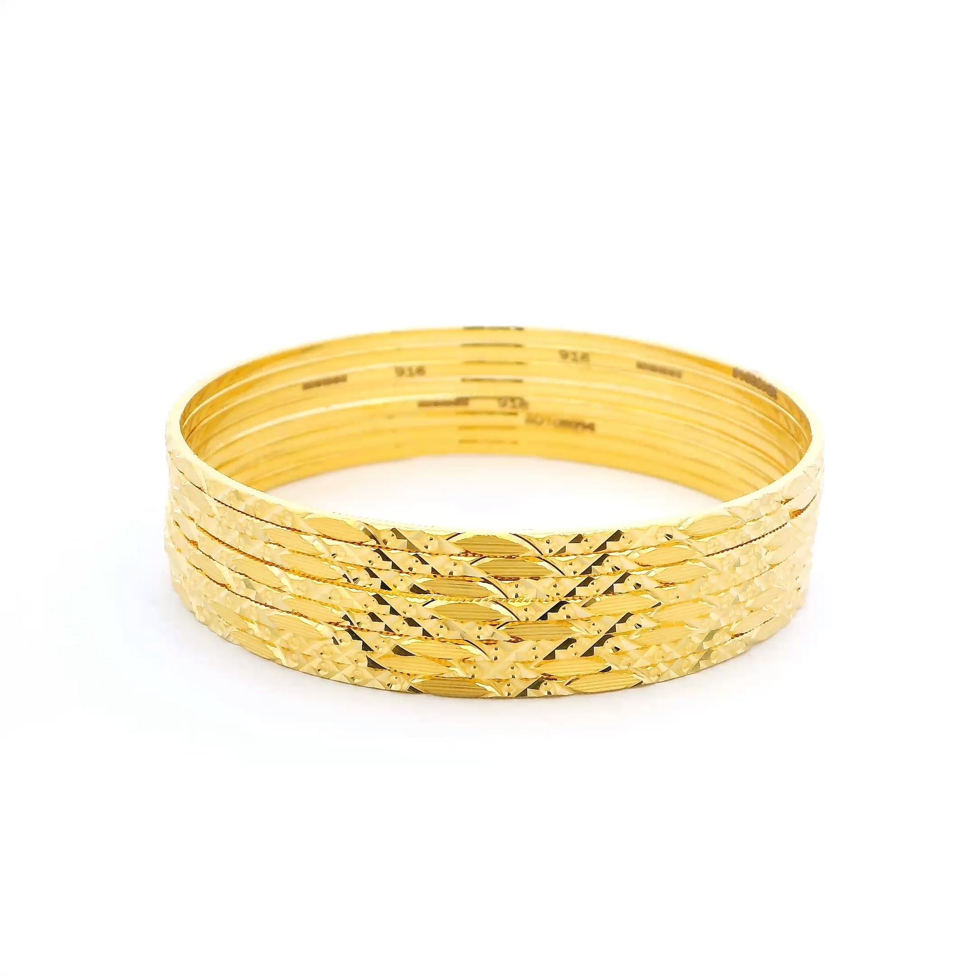 Traditional Set of Eight 22ct Gold Bangles with Elegant Detailing