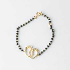 18ct Yellow Gold / 18ct White Gold Diamond Adjustable Children's Bracelet with Small Feet and Black Beads MCS4275 - Minar Jewellers