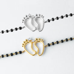 18ct Yellow Gold / 18ct White Gold Diamond Adjustable Children's Bracelet with Small Feet and Black Beads MCS4275 - Minar Jewellers